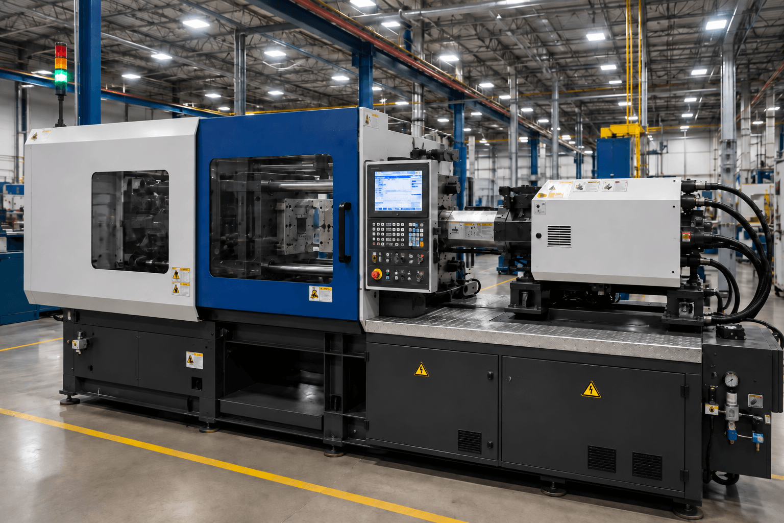 A machine on a manufacturing floor that is used to injection mold parts.