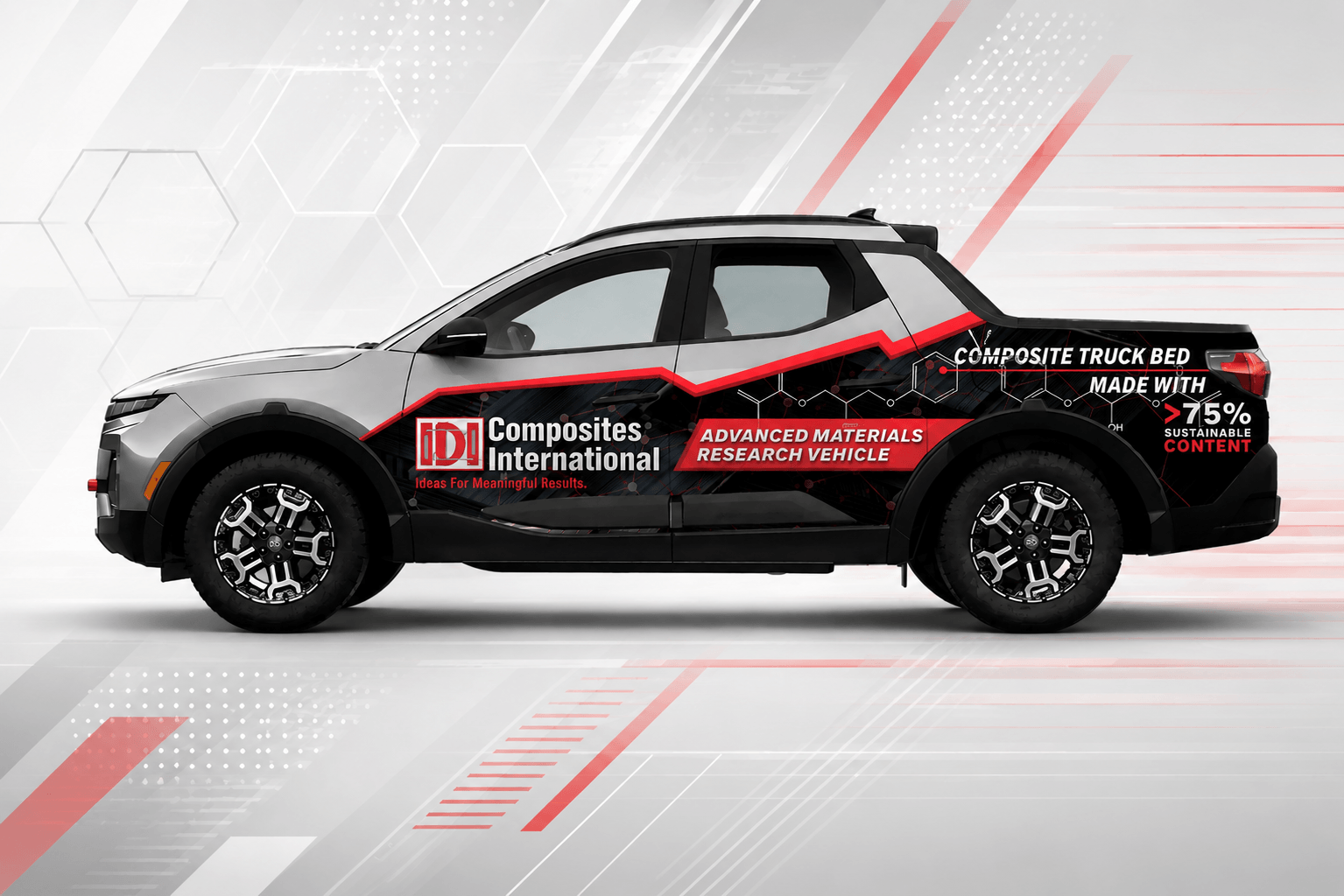 A picture of a Hyundai Santa Cruz with a decorative wrap on it that says IDI Composites International and talks about the sustainable content that was used in the truck bed of this vehicle.